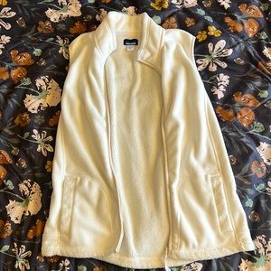 White fleece vest, fits S or M, zip up vest with pockets!
